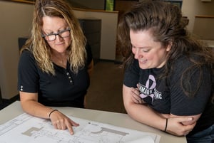 Reviewing-plans_688x462